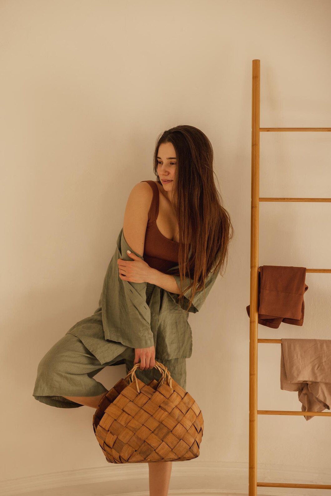 beautiful fairskinned young girl posing fashionably camera looking away while standing indoors longhaired brunette wears casual summer clothes home lifestyle leisure concept 197531 32230